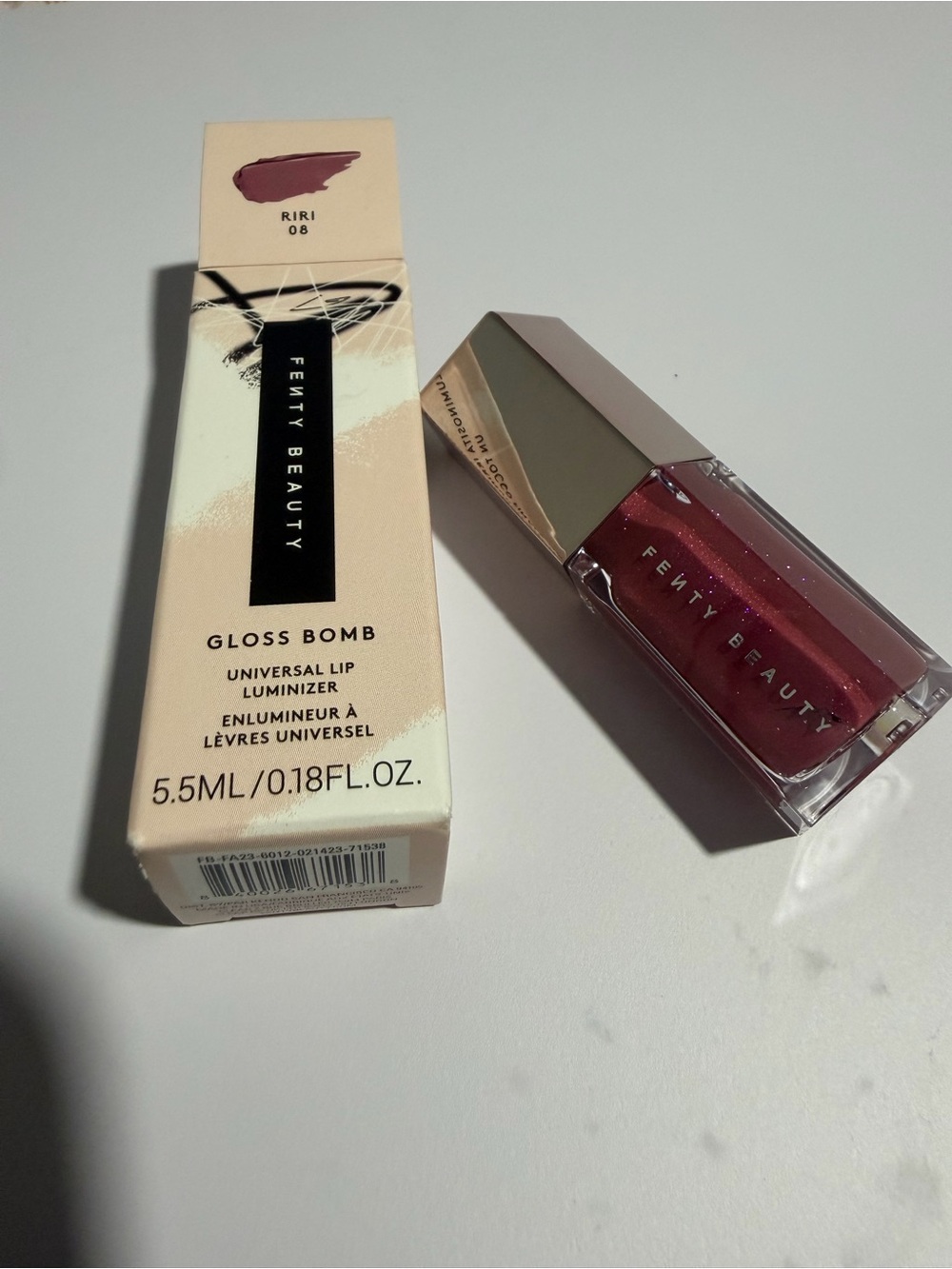 Fenty Beauty Gloss Bomb Lip Luminizer in Riri 08 Plum Pink